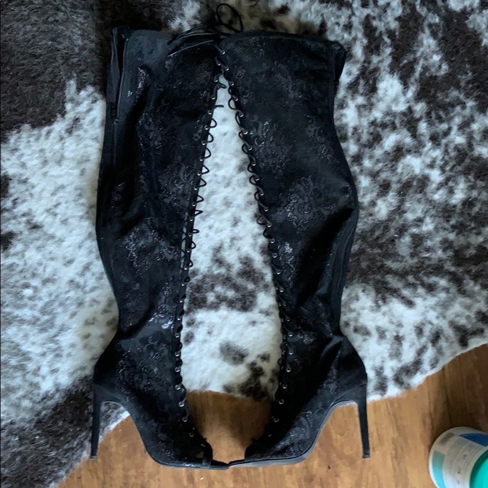 Thigh high lace up boots